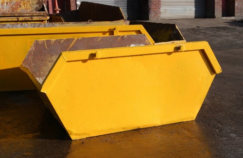 Builders using a large enclosed and lockable skip for construction debris