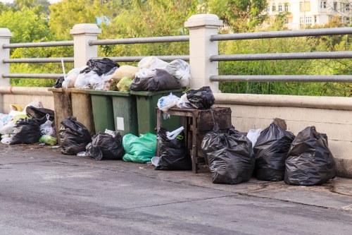 Eco-friendly recycling process with an enclosed skip in Newham